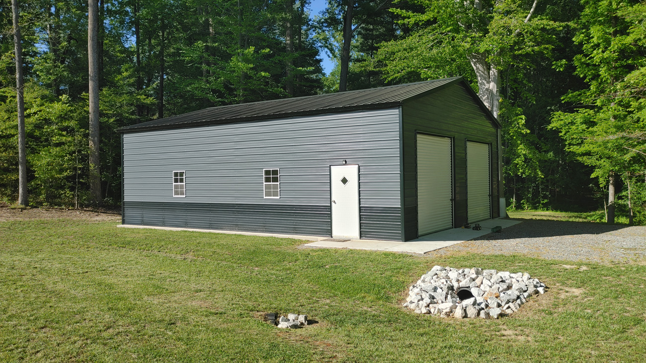 30' wide, 40' long, 12' tall metal garage with vertical metal roof and horizontal siding